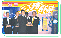 The Chief Engineer of the ELD, Dr. LEUNG Kin-man, takes a photo with the then Secretary for the Civil Service, Mr. Joseph W.P. WONG, at the opening ceremony of "A Distinguished Civil Service" documentary series exhibition